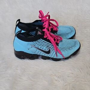 Nike Blue and Pink Sneakers with Bold Design